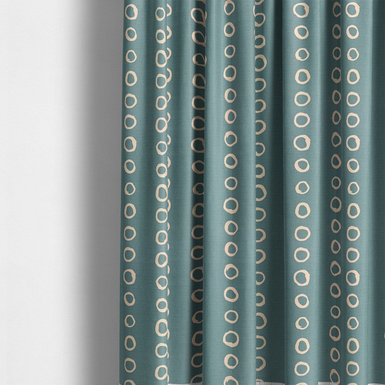 Polka dot and spotted curtain fabrics in soft neutral and colourful tones.