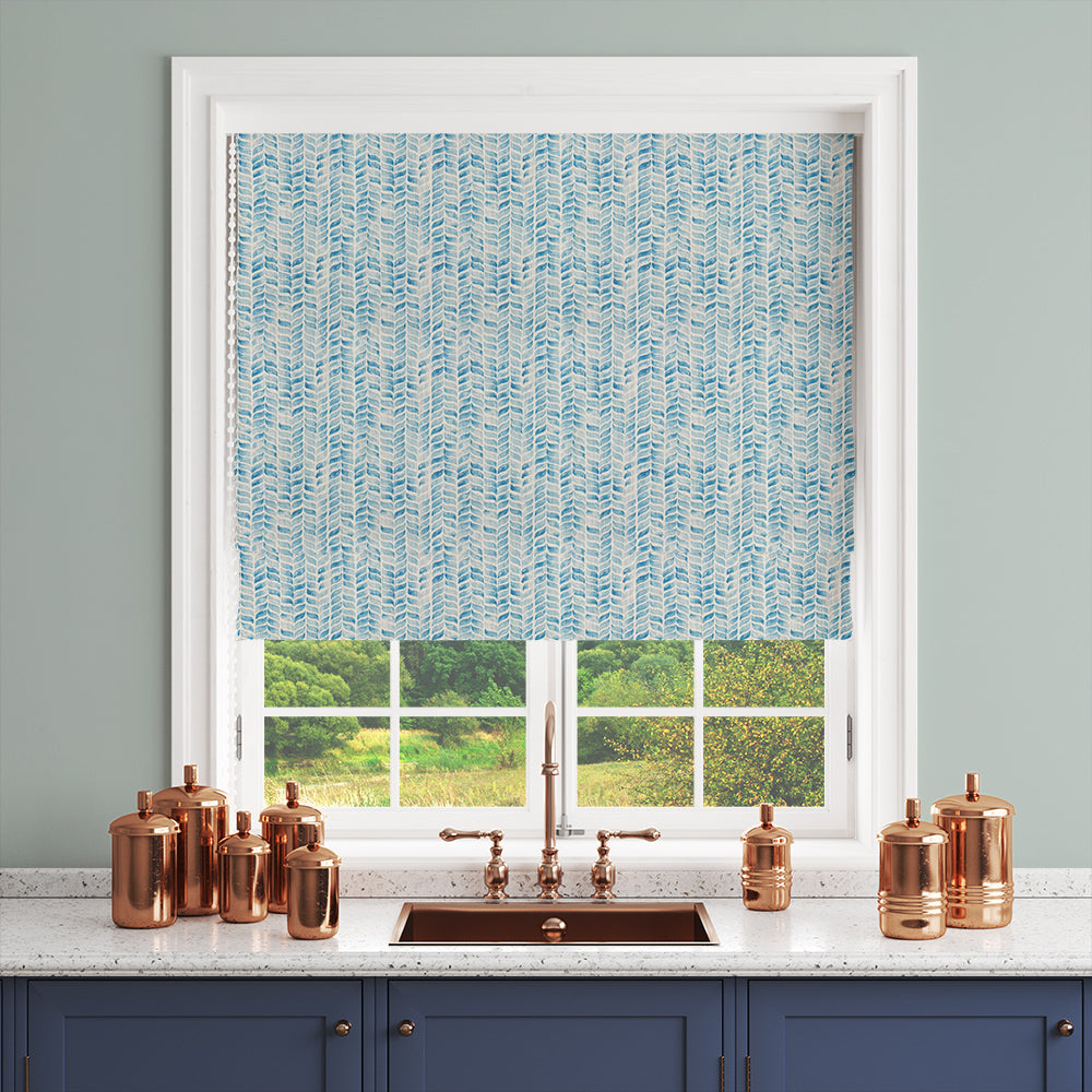 Roman blind panel of blue linen-blend fabric with subtle texture in a serene living room setting