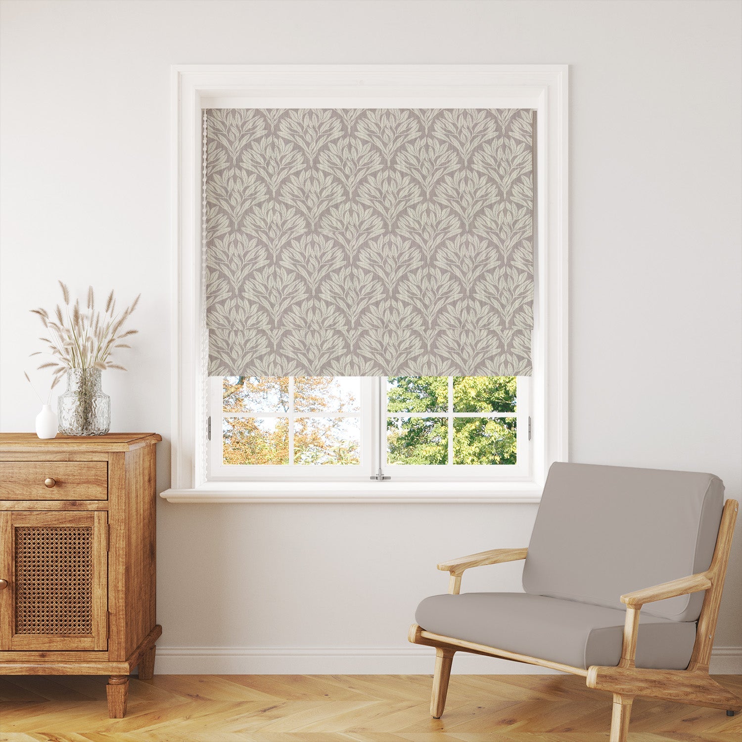 Beige blind fabric styled as a Roman blind in a neutral living room with wooden furniture