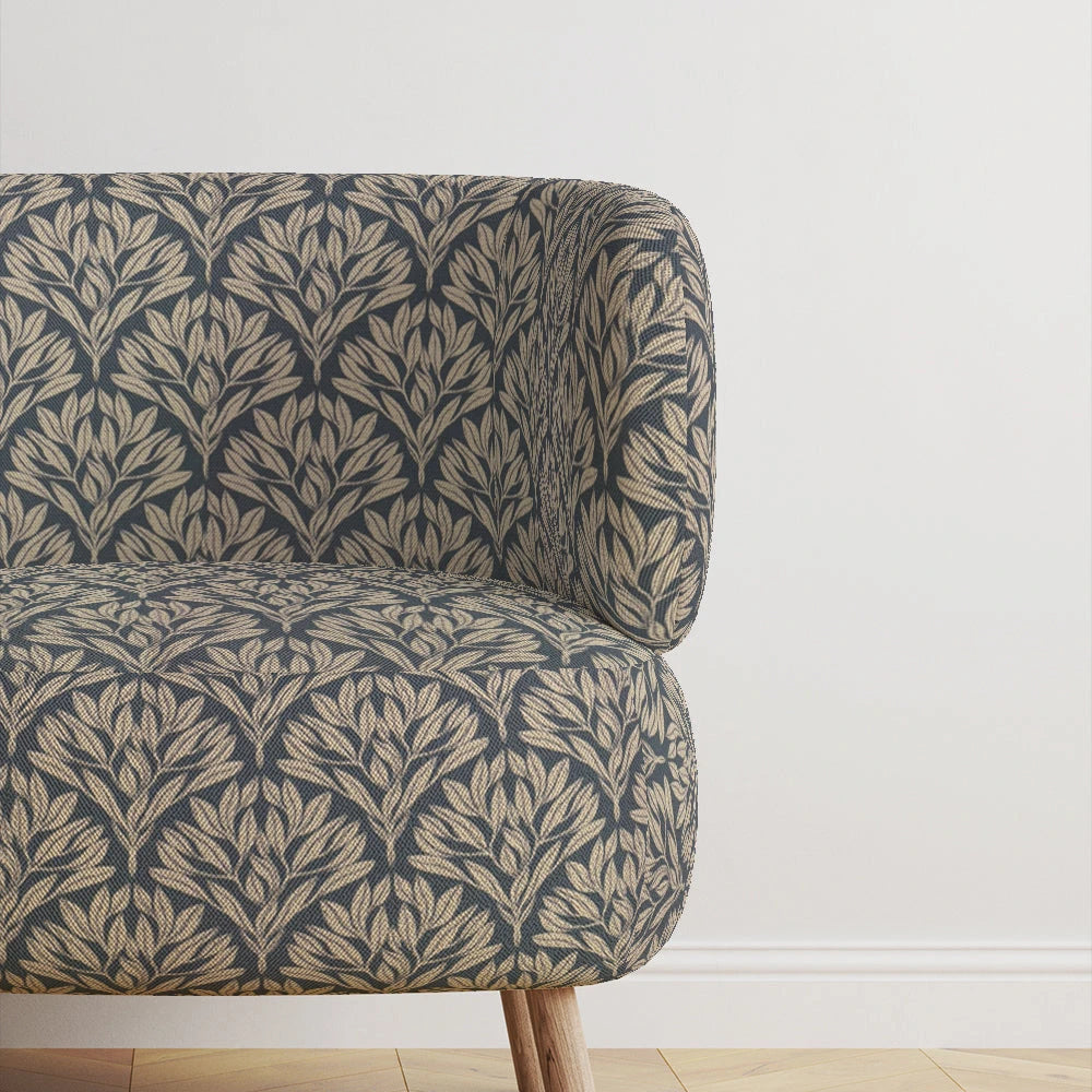 Linen upholstery fabric armchair with navy and beige botanical leaf pattern in modern living room