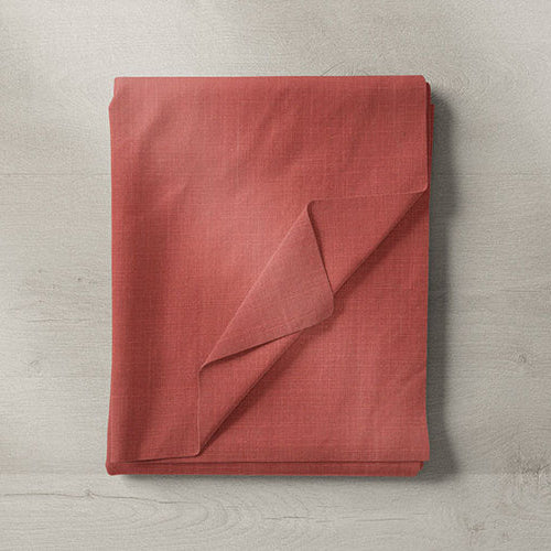 Red and orange fabrics in warm tones for curtains, blinds and upholstery projects.