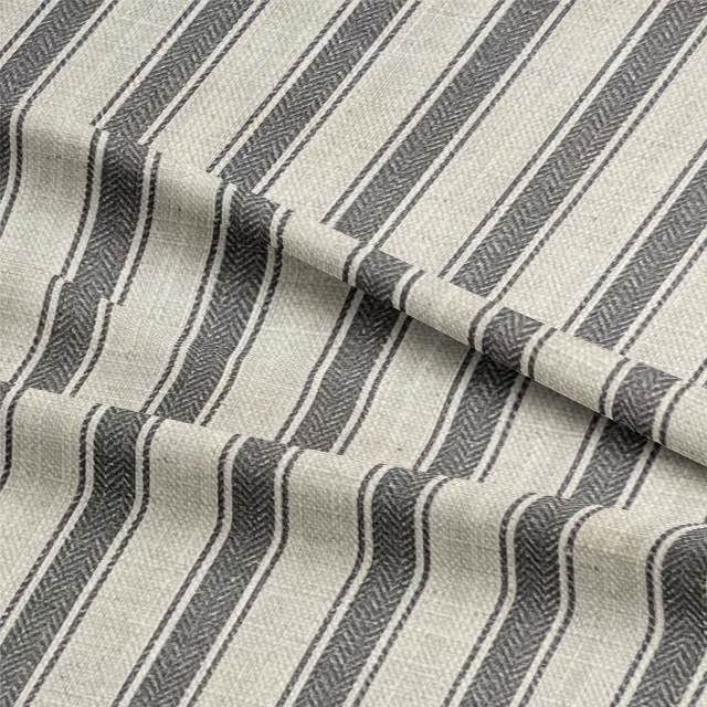 Albany Stripe Fabric in a beautiful blue, white, and gray pattern, perfect for upholstery and home decor projects
