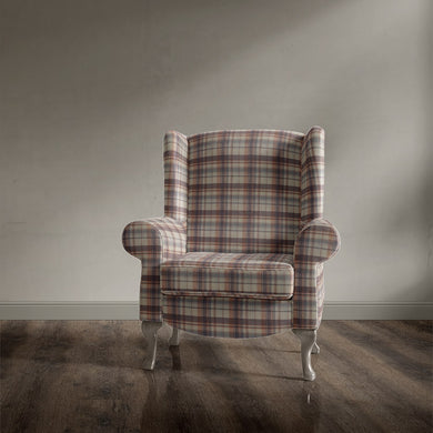 Accent chair covered in Alder Plaid Clementine checked upholstery fabric