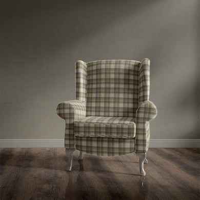 Traditional armchair upholstered in Alder Plaid Green check fabric