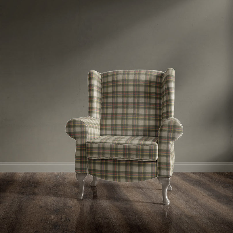 Traditional armchair upholstered in Alder Plaid Green check fabric
