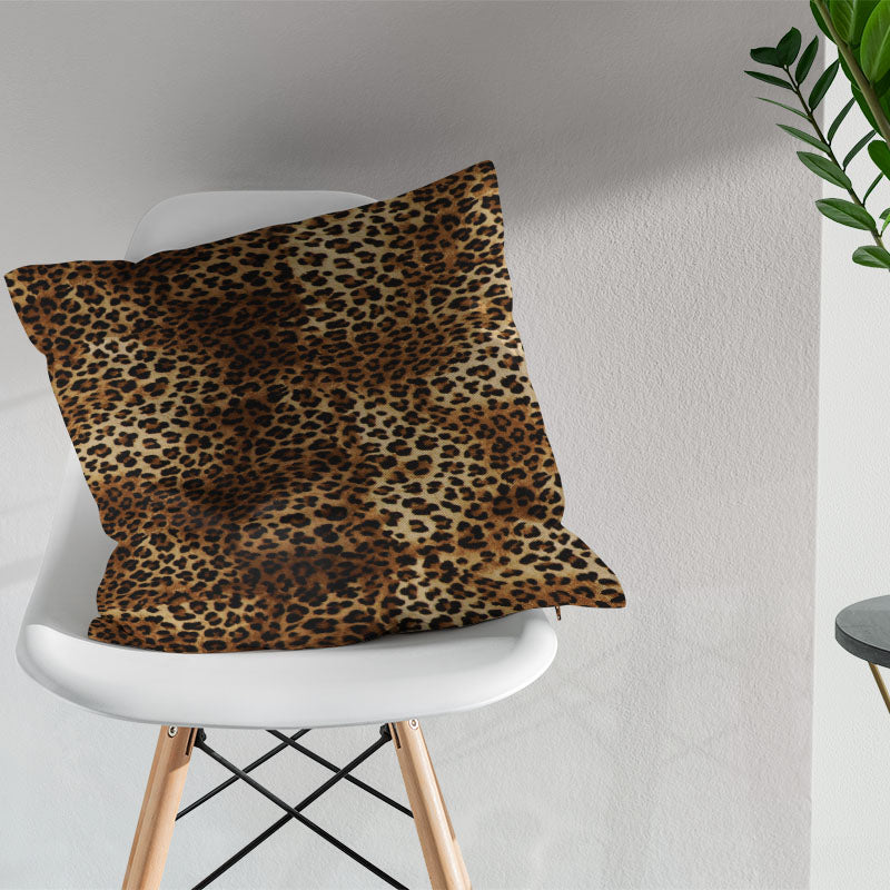 Arabian leopard print fabric cushion showing warm animal print texture