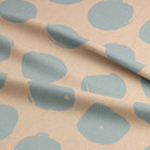 Spotted polka dot curtain fabric in baby blue from the Arno collection, perfect for modern interiors.