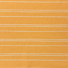 Ochre striped upholstery fabric with a warm, inviting feel