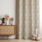 Baku Paisley Linen curtain fabric in ochre yellow, styled as elegant draped curtains in a warm-toned interior