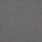 Dove grey woven upholstery fabric with a structured diamond trellis design