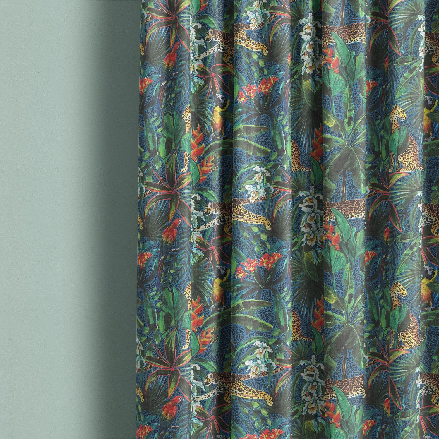 animal curtain fabric with vibrant rainforest design featuring leopards and tropical foliage used as curtains