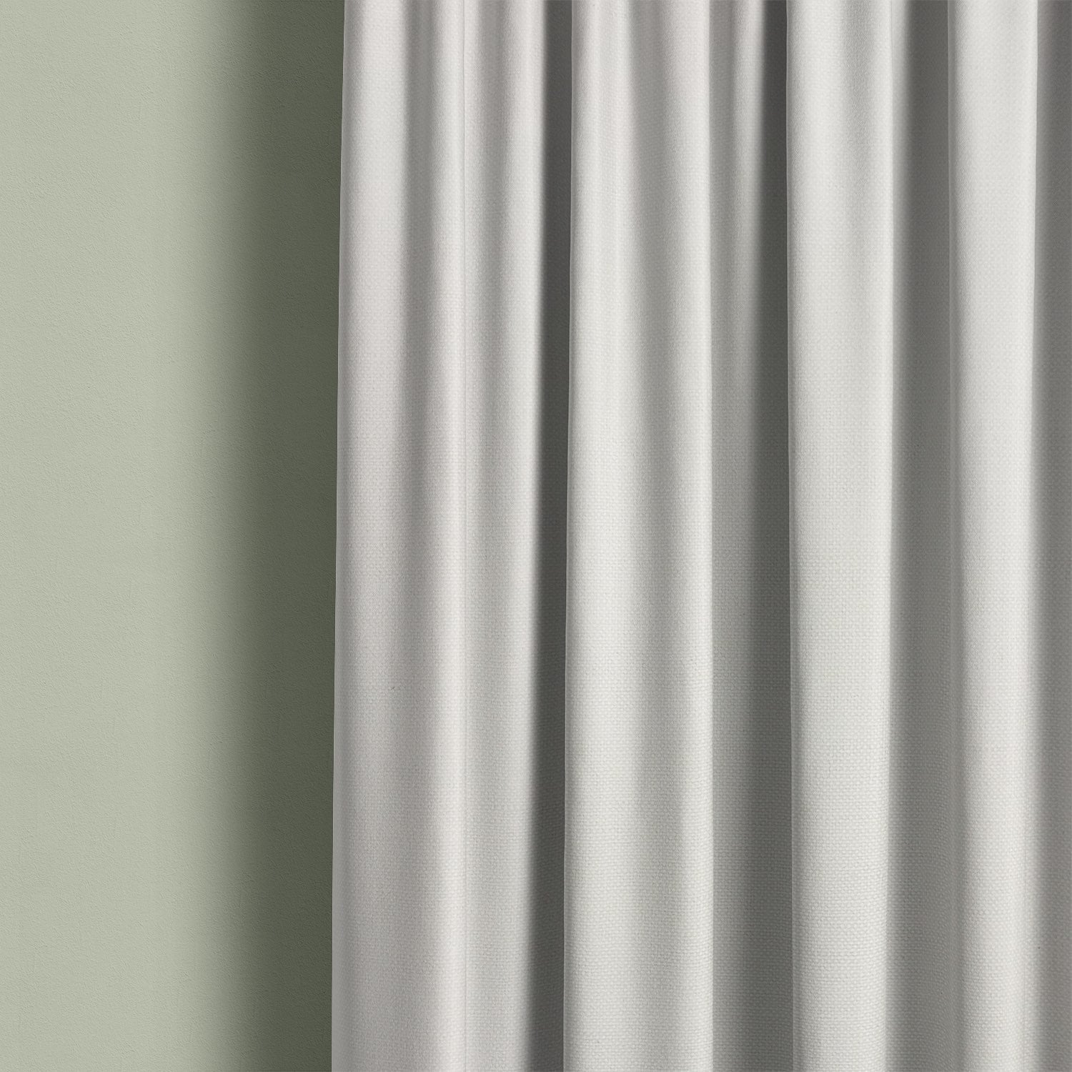 Boughton Plain White cotton linen curtain fabric hanging in soft folds