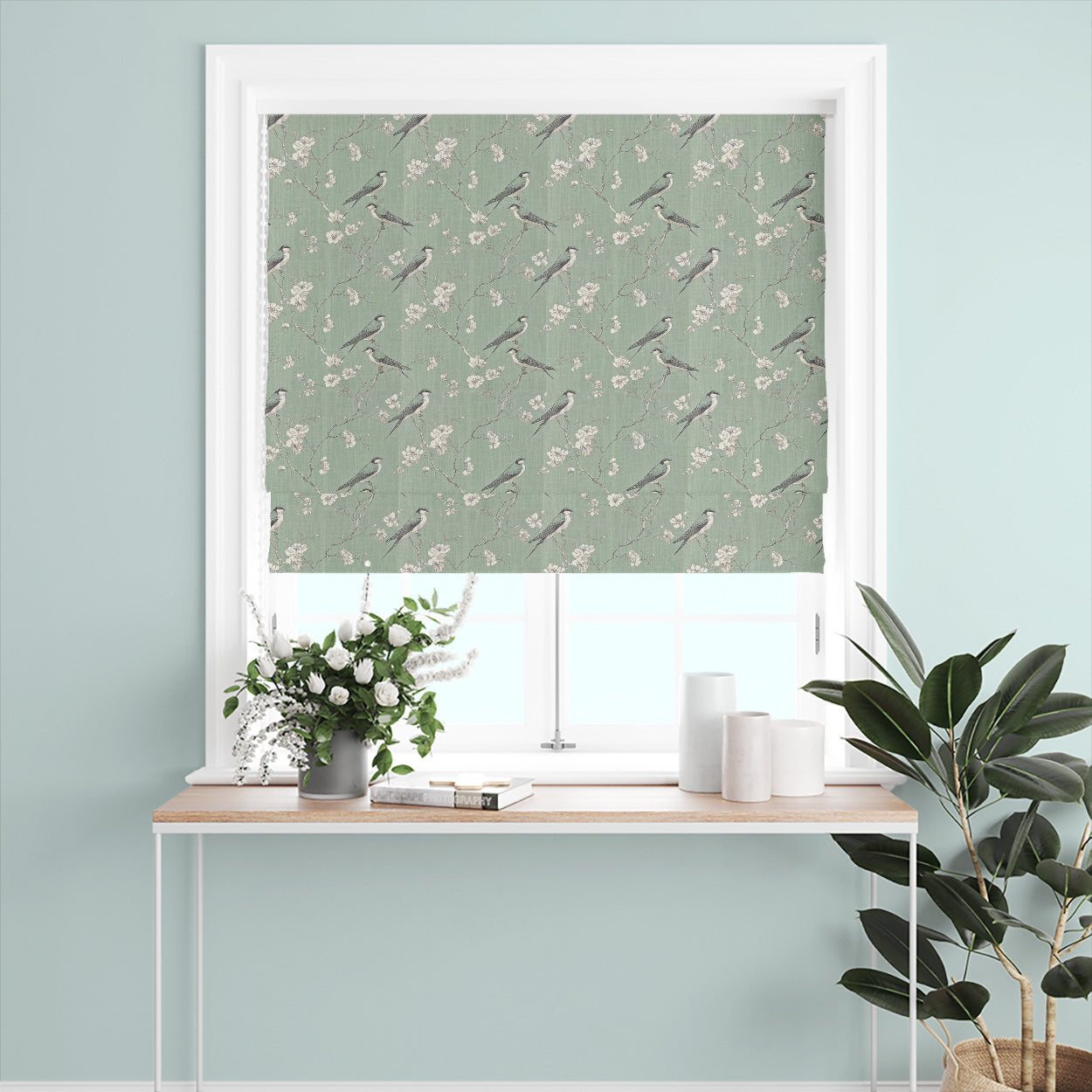 Bourton bird fabric linen curtain blind in soft green with illustrated birds and blossom branches