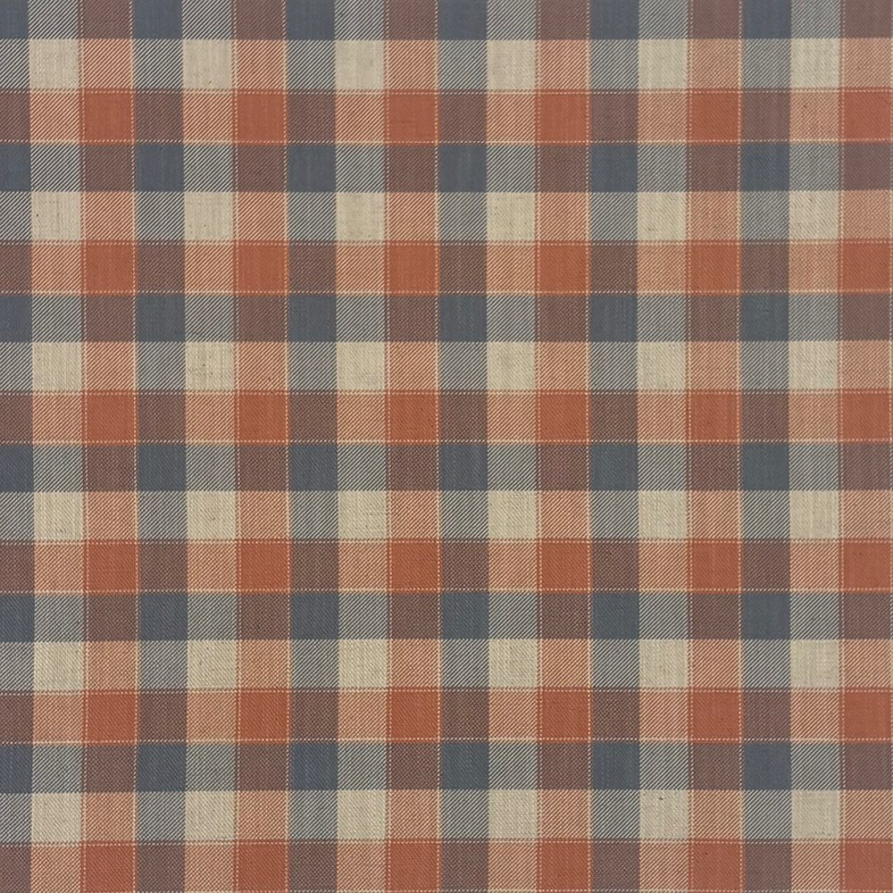 Cairn Plaid Tangerine orange and cream check linen curtain fabric hanging in folds