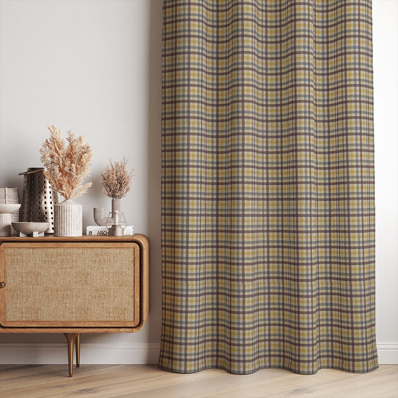 Cairn Plaid Yellow check linen curtain fabric styled as full-length pleated curtains