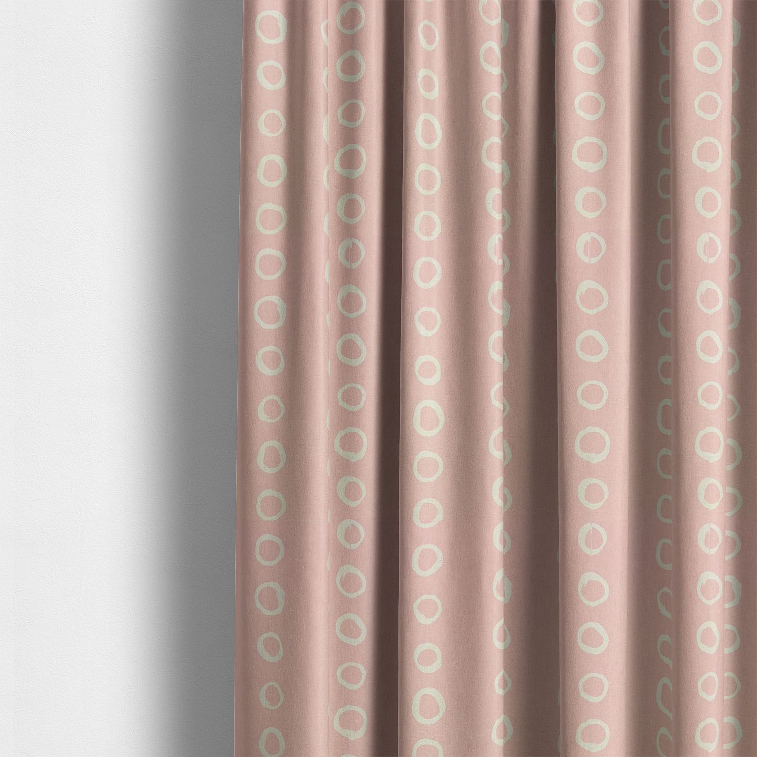 Calaggio Blush Spotty Curtain Fabric - Styled Room View featuring a modern interior with blush pink polka dot curtains.