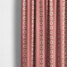 Calaggio Coral Spot Curtain Fabric - Interior Styling displaying a modern setting with coral polka dot curtains.