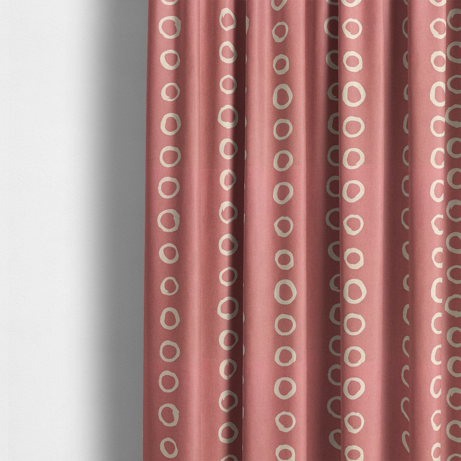 Calaggio Coral Spot Curtain Fabric - Interior Styling displaying a modern setting with coral polka dot curtains.