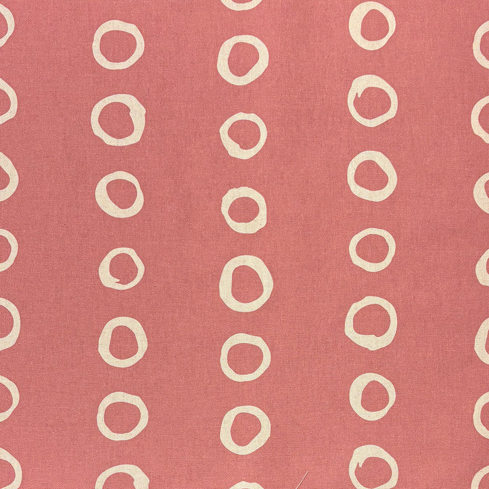 Calaggio Coral Polka Dot Curtain Fabric - Flat Sample with a vibrant coral hue and contrasting circular pattern.