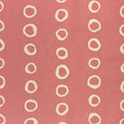 Calaggio Coral Polka Dot Curtain Fabric - Flat Sample with a vibrant coral hue and contrasting circular pattern.