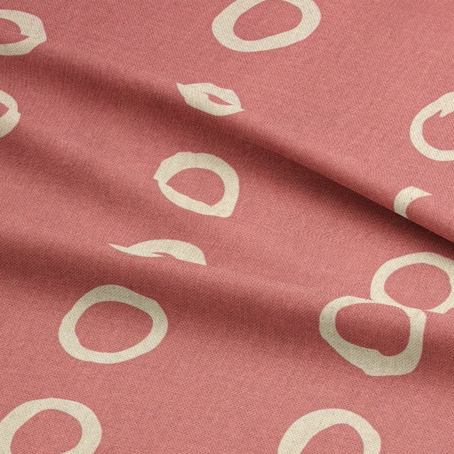 Calaggio Coral Spotty Curtain Fabric - Draped Fabric Detail emphasizing the fabric’s smooth texture and flowing drape.