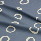Calaggio Navy Spot Curtain Fabric - Draped Sample emphasizing the structured texture and rich color contrast.
