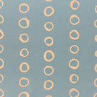 Calaggio Sky Polka Dot Curtain Fabric - Flat Sample in a soft blue hue with subtle, painterly polka dots.