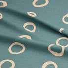 Calaggio Teal Spotty Polka Dot Fabric - Draped Sample showcasing its texture and elegant drape.