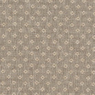 Biscuit-toned heavyweight upholstery fabric with a subtle woven pattern.
