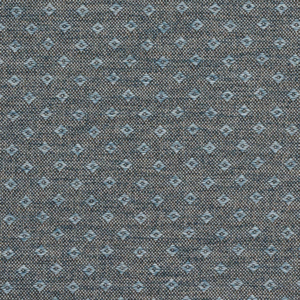 Chambray blue fire-retardant upholstery fabric with a structured dobby weave.