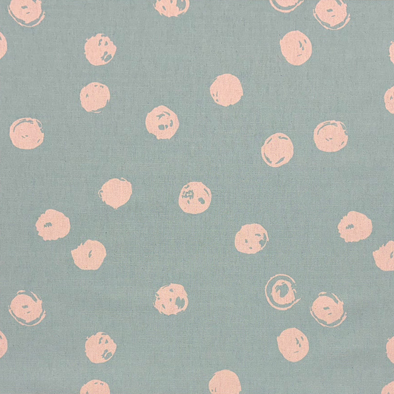 Chiese duck egg polka dot curtain fabric with a delicate spotted pattern for home décor.