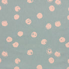 Chiese duck egg polka dot curtain fabric with a delicate spotted pattern for home décor.