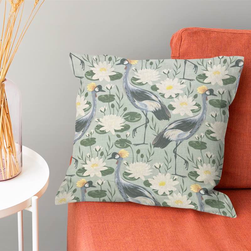Luxurious green linen fabric for upholstery, adorned with graceful crane birds