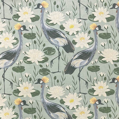 Crane Birds Linen Curtain Fabric - Green in natural setting, creating a serene atmosphere