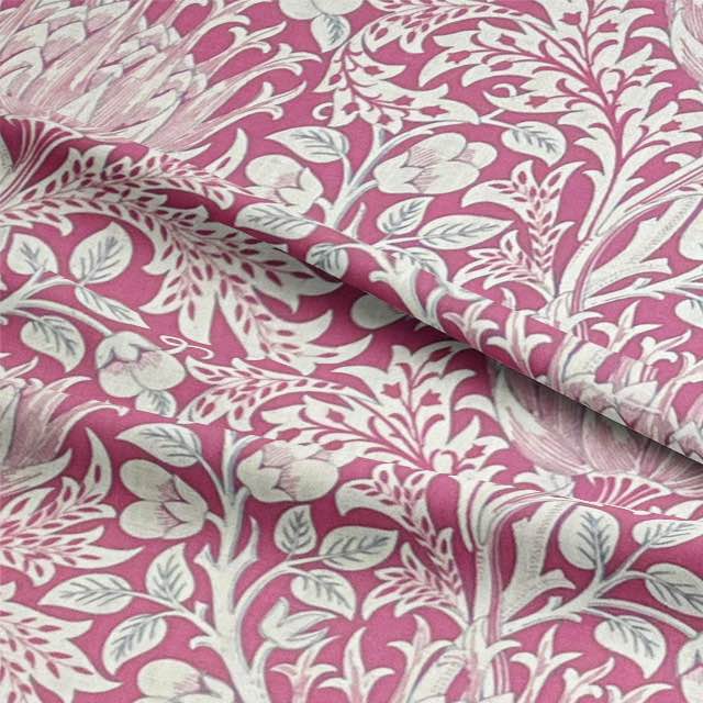 Beautiful Cynara Flower Fabric, featuring vibrant purple and pink blooms on a high-quality, textured fabric perfect for upholstery and home décor projects