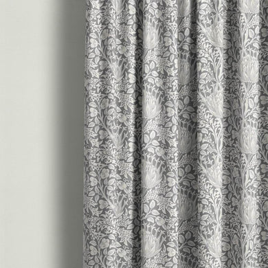 Beautiful Cynara Flower Upholstery Fabric with elegant floral pattern in soft, muted colors ideal for high-quality furniture designs