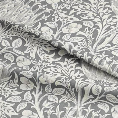 Close-up image of Cynara Flower Upholstery Fabric showcasing intricate floral pattern and durable, high-quality material perfect for furniture and home decor projects