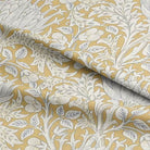 Beautiful close-up image of Cynara Flower Fabric, a delicate and intricate floral pattern perfect for home decor and crafts