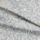 Beautiful Cynara flower fabric in vibrant pink and green colors, perfect for adding a touch of elegance to any home decor or fashion project