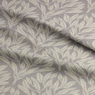 Softly textured Driftwood Leaf Dove Grey fabric for upholstery projects.