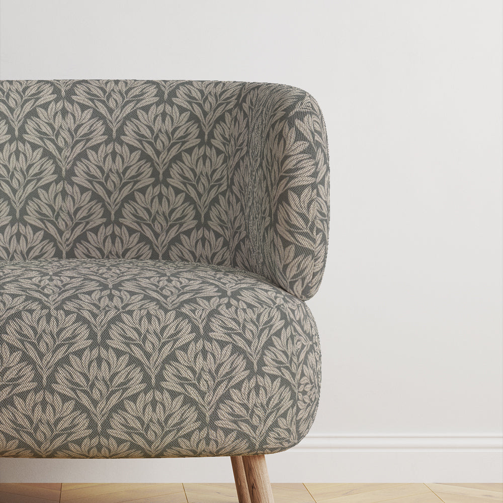 Chair covered in Driftwood Leaf Fennel fabric, ideal for upholstery use.