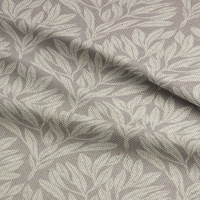 Folded Driftwood Leaf Natural fabric, highlighting its intricate leaf pattern.