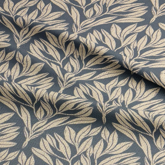 Draped Driftwood Leaf Navy fabric, emphasizing its elegant woven design.