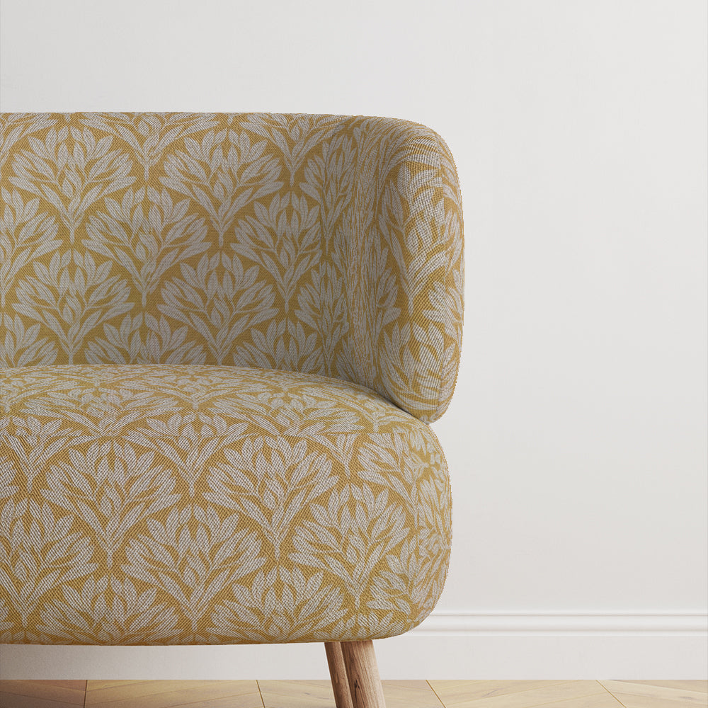 Chair featuring Driftwood Leaf Ochre fabric, ideal for stylish upholstery.