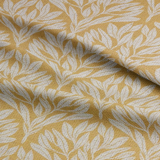 Soft folds of Driftwood Leaf Ochre fabric, showcasing its durable texture.