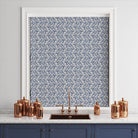 Beautifully draped Duloe Cotton Curtain Fabric in Blue, creating a chic and sophisticated window treatment