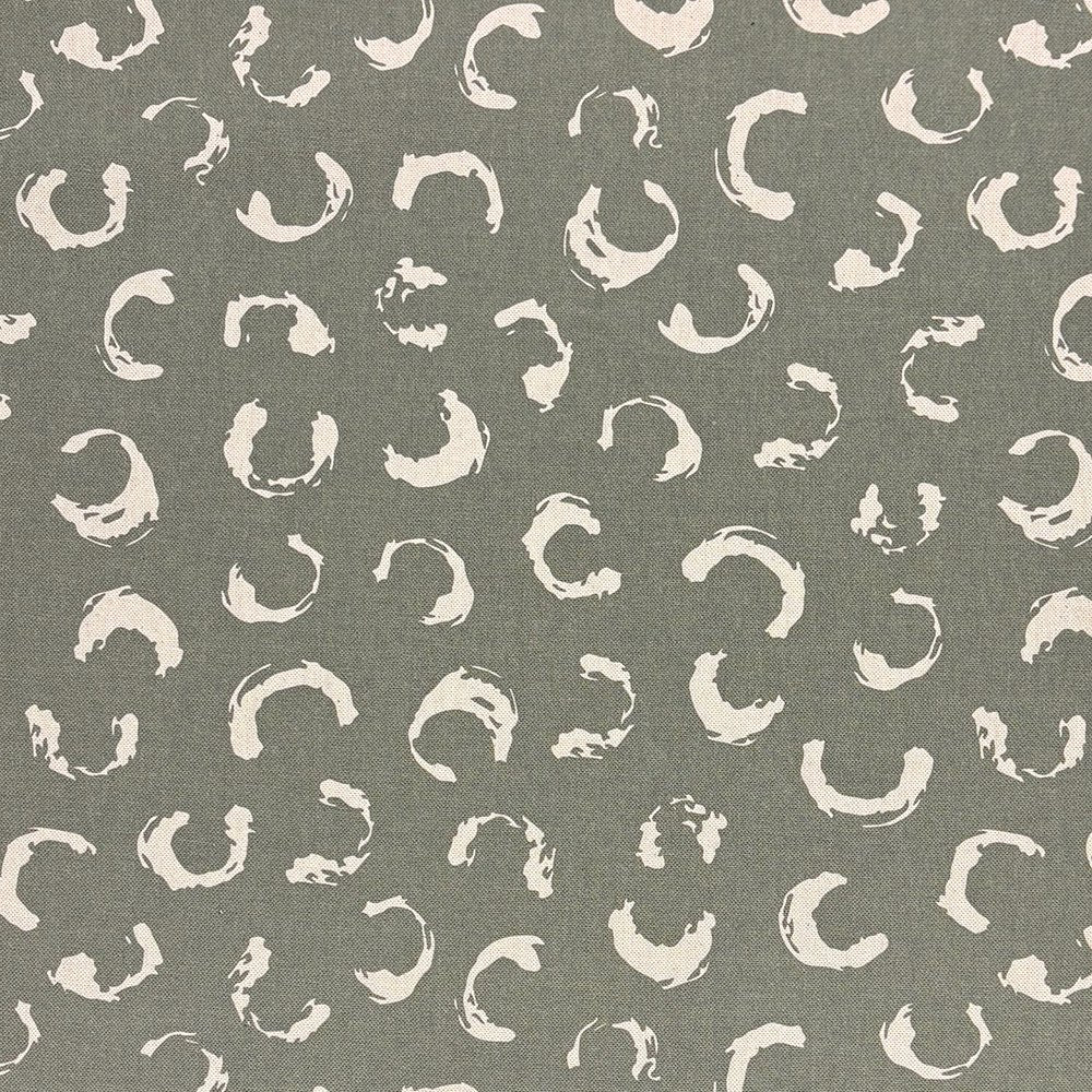 Fennel green printed upholstery fabric featuring an artistic, organic pattern, ideal for sofas, chairs, and stylish soft furnishings.