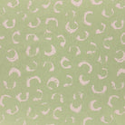 Lemongrass green printed upholstery fabric with a fresh, modern pattern, designed to bring vibrancy to chairs, sofas, and cushions.