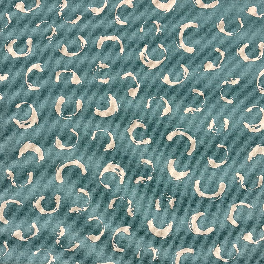 Teal printed upholstery fabric featuring an abstract artistic pattern, designed for stylish, modern interior décor and soft furnishings.