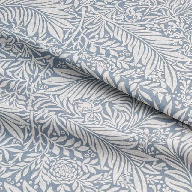 Close-up view of high-quality Duston Fabric in a beautiful shade of blue, perfect for upholstery and home decor projects